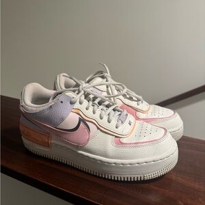 Nike Air Force 1 in White (Creamy) with pink, purple, orange embellishment